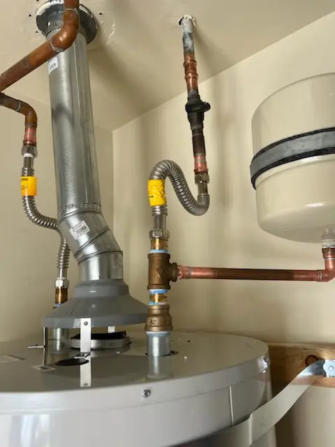 Water heater installation and plumbing repair in Alpha